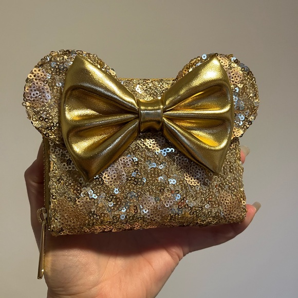 Loungefly Handbags - Disney Parks gold sequin Loungefly wallet with bow